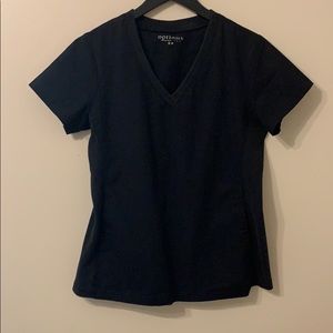 Black v-neck scrub top with two pockets